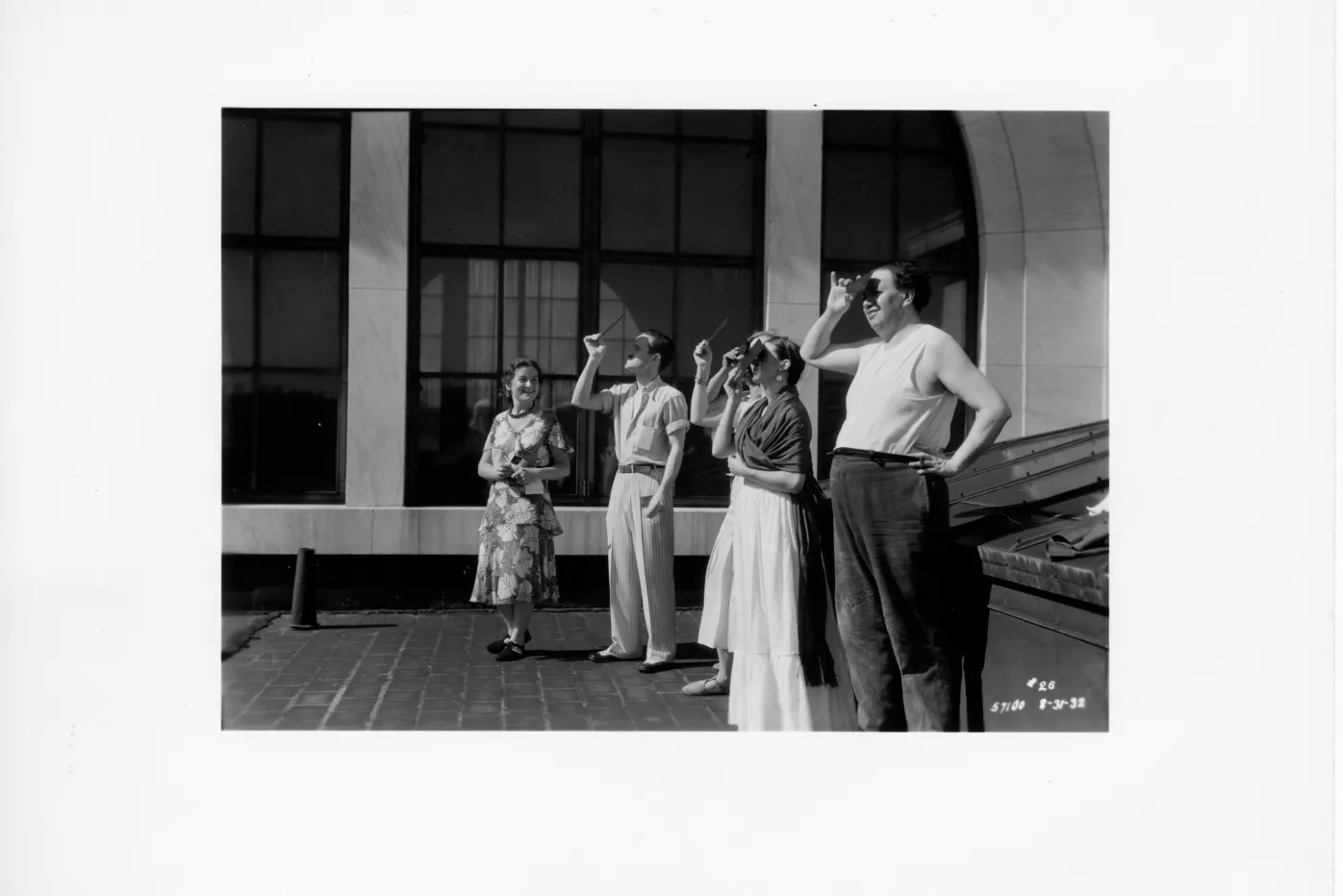 Diego Rivera and Frida Kahlo observing an Eclipse on the roof of the DIA