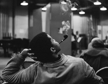 Man smoking a tobacco pipe