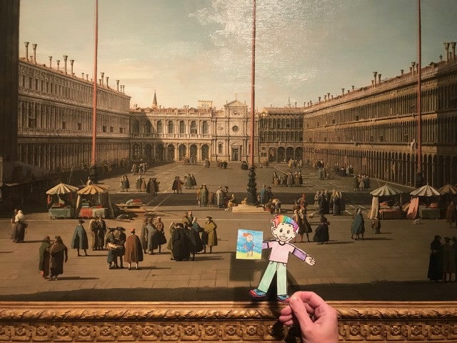 Flat Stanley in front of a painting