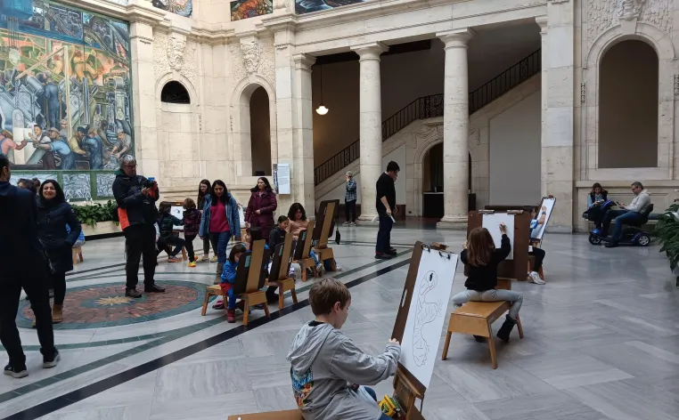 Visitors drawing in Rivera Court