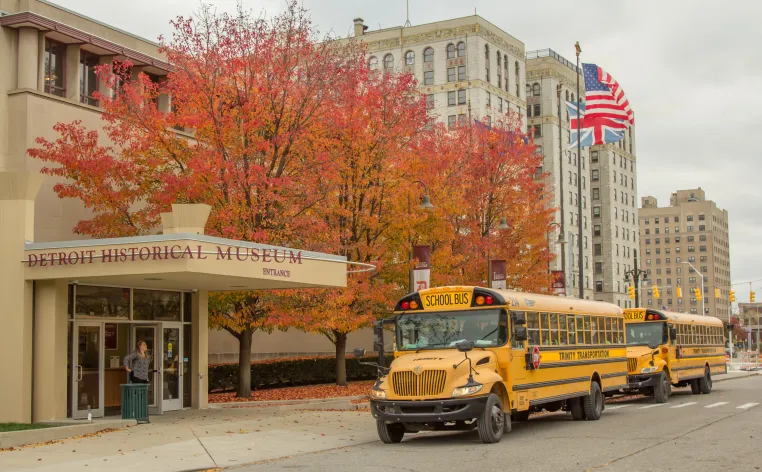 Detroit Historical Museum entrance with two school buses out front