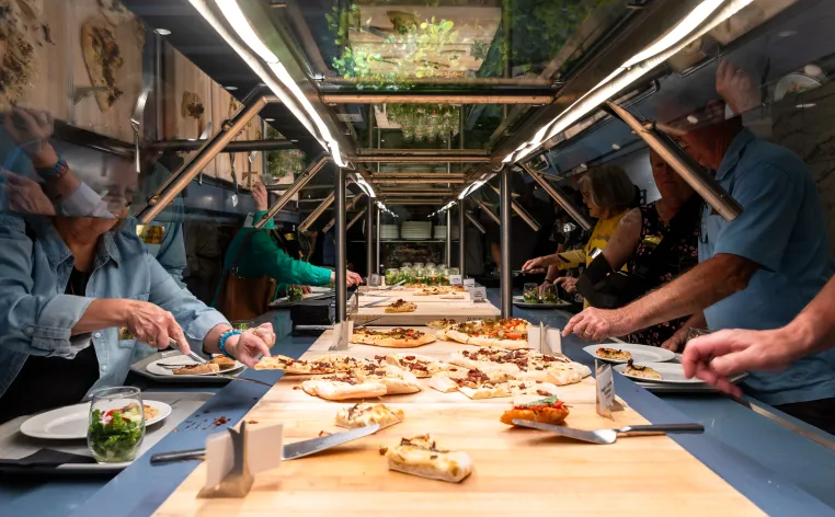 Digging into the pizza bar at member movie night