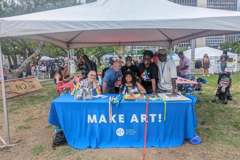 DIA staff and PRISM members at the DIA Make Art booth a the motor city pride parade, 2025