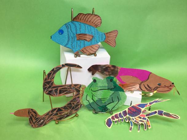 Examples of great lakes creatures made in the DIA's artmaking studio