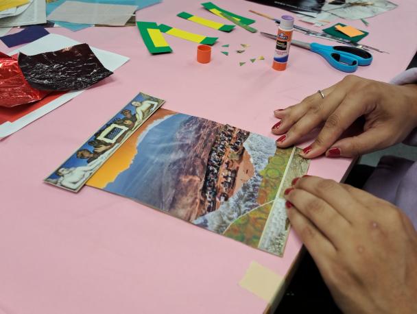 Someone making a mixed-media collage in the DIA's Artmaking Studio