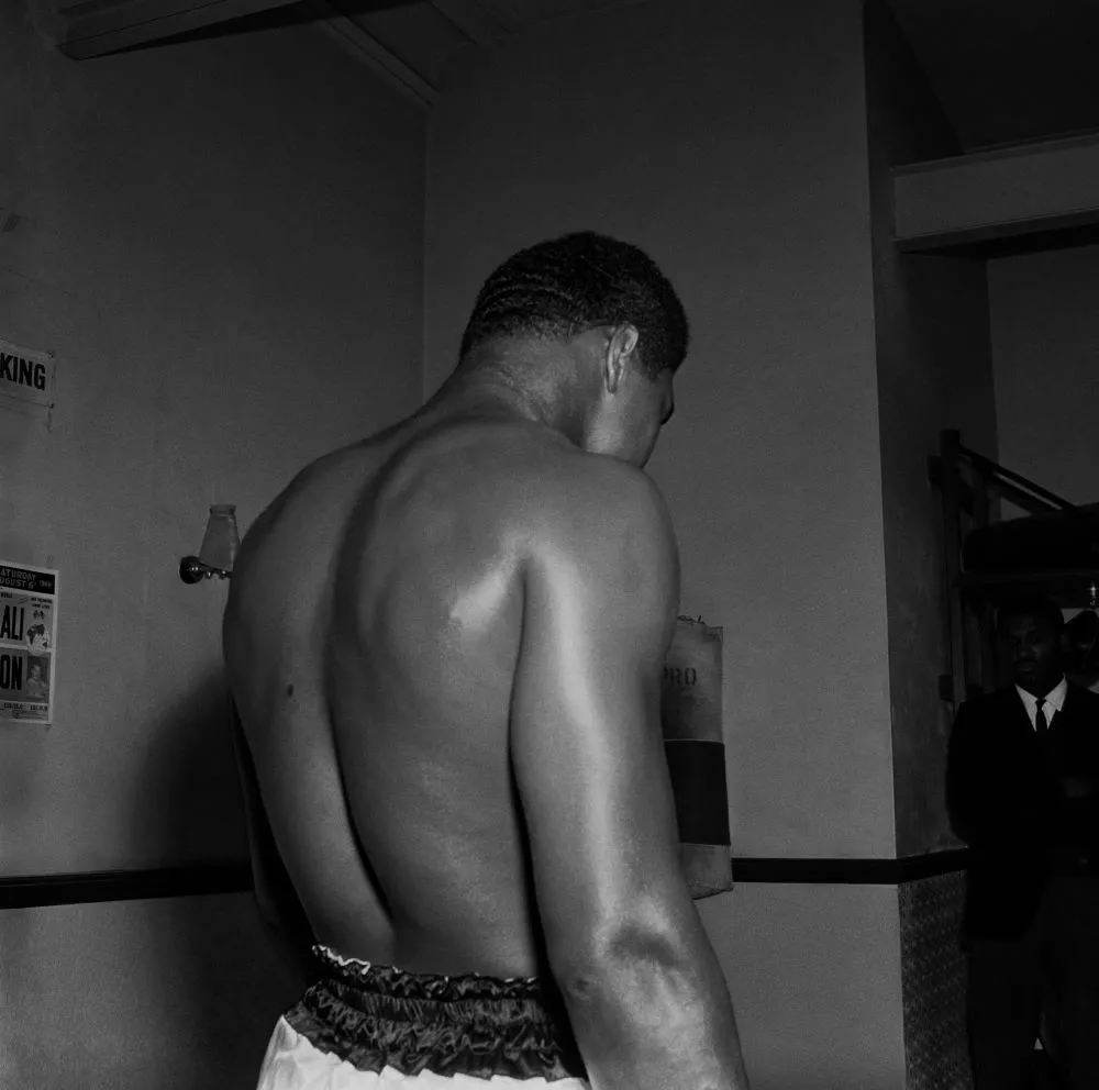 James Barnor (Ghana, b. 1929). Muhammad Ali preparing for his fight against Brian London, 1966 (printed 2010–20). Gelatin silver print. Galerie Clémentine de la Féronnière, Paris. © James Barnor, courtesy Galerie Clémentine de la Féronnière, Paris.