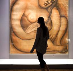 Person looking at art