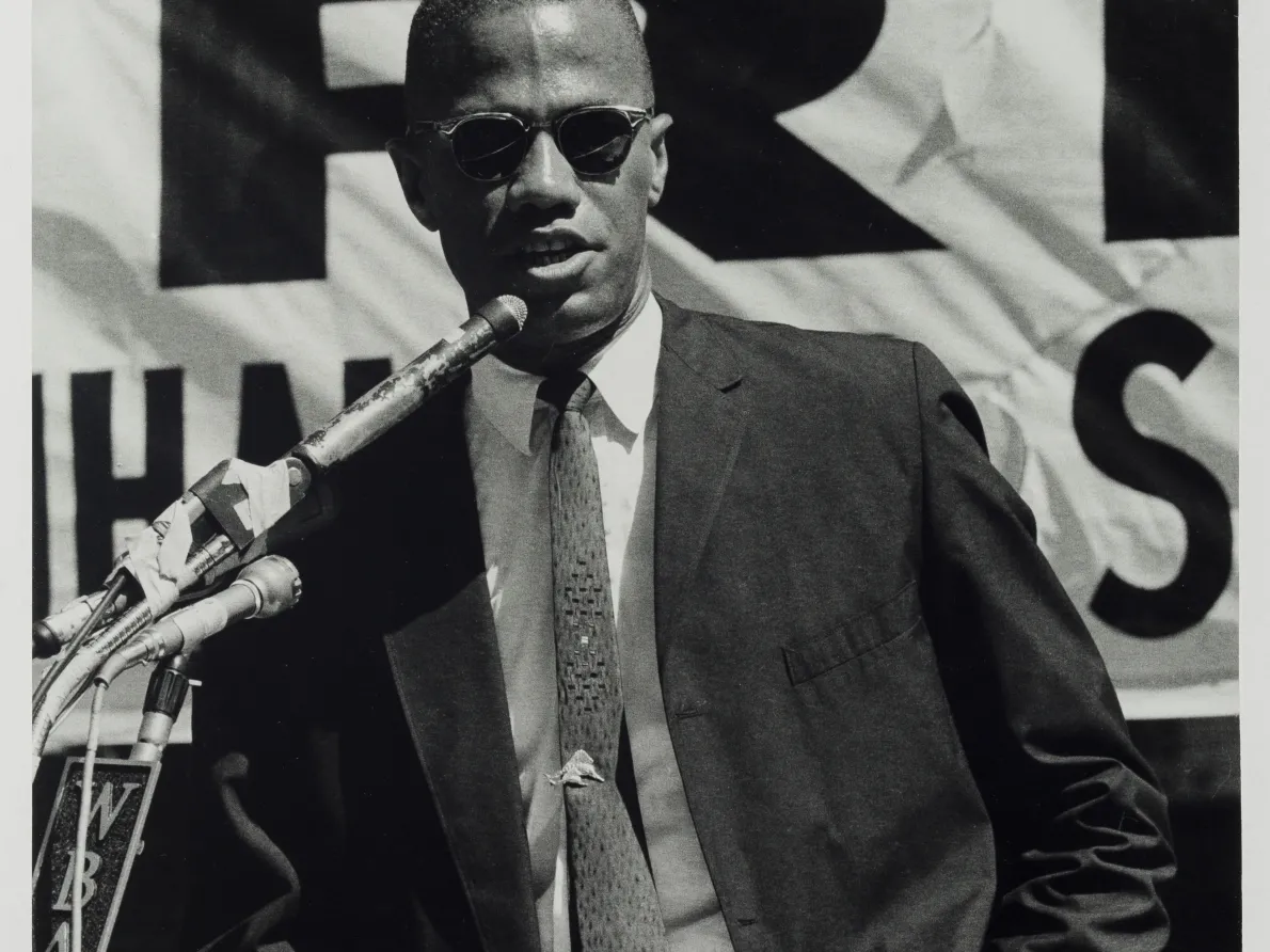 “Malcolm X Speaks at a Rally in Harlem (at 115th St. &amp; Lenox Ave.), New York, September 7, 1963,” 1963, Adger Cowans, gelatin silver print. Detroit Institute of Arts