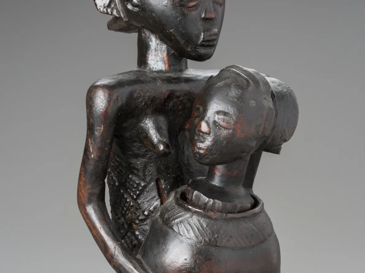 Woman holding bowl with child, 18th century, Mwanza workshop, African, wood. Margaret Demant Bequest, Detroit Institute of Arts