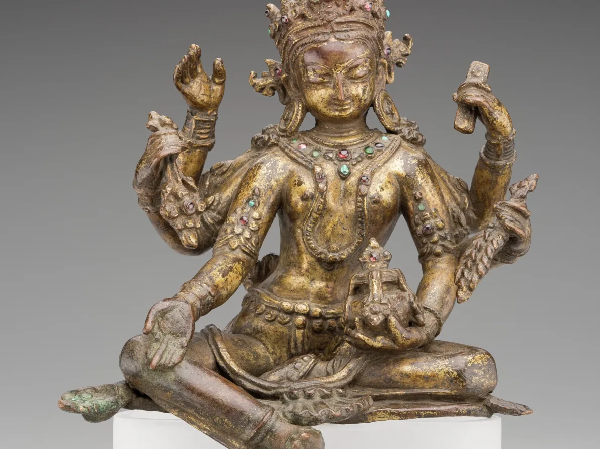 “Vasudhara, Goddess of Wealth and Abundance,” 1100s, Nepal, copper, gold, gem stones. Detroit Institute of Arts