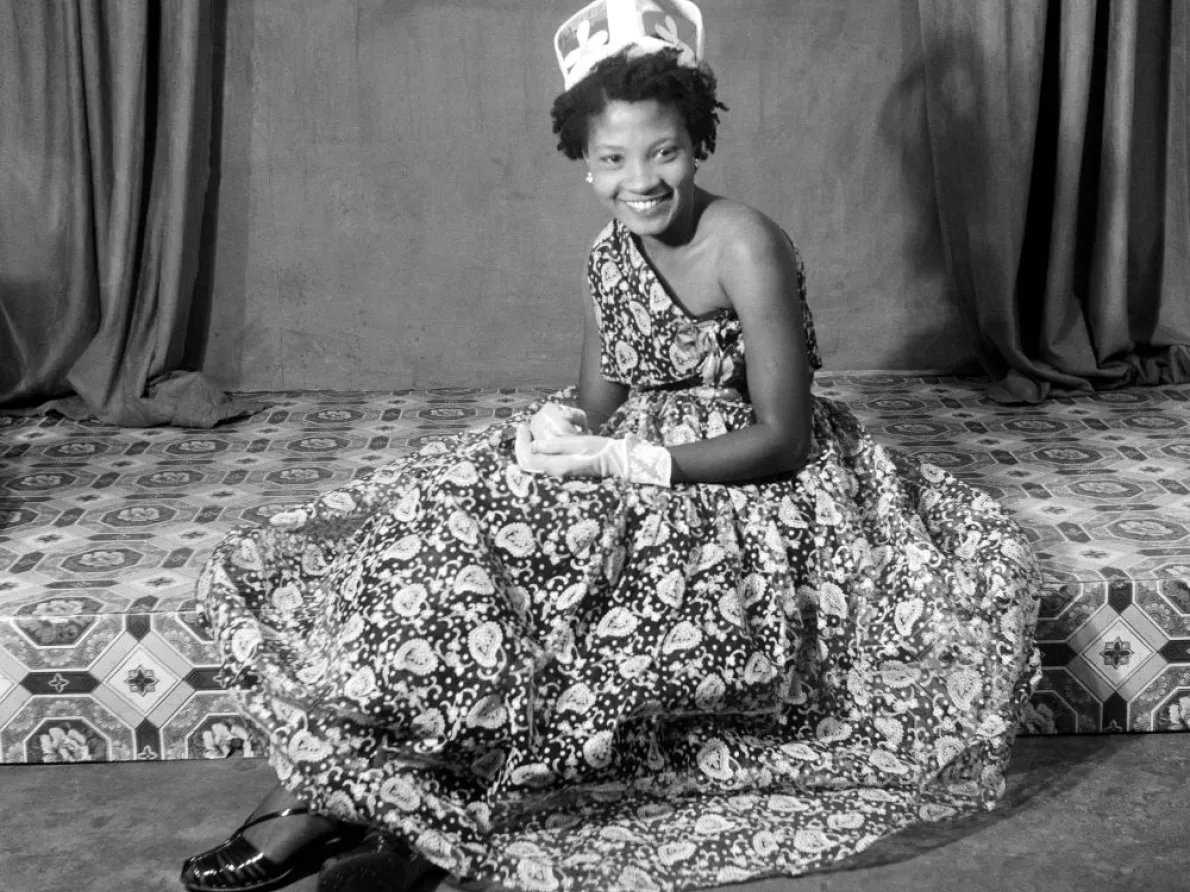 James Barnor (Ghana, b. 1929). Naa Jacobson as Ballroom Queen after a fashion show, Ever Young Studio, Jamestown, Accra, c. 1955 (printed 2010–20). Gelatin silver print. Autograph, London.