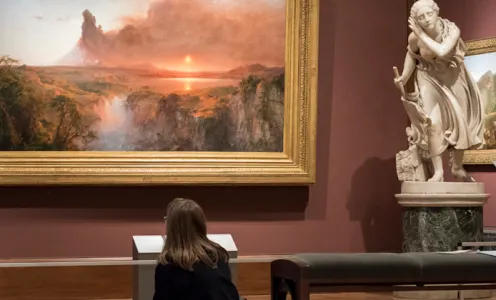 Young woman in art gallery