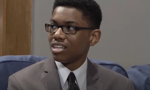 A young man speaking during Courageous Conversations