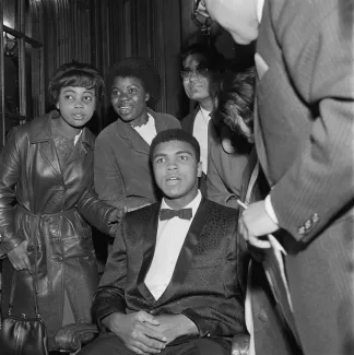 James Barnor (Ghana, b. 1929). Muhammad Ali surrounded by fans after winning the Earl’s Court fight against Brian London, London, 1966 (printed 2010–20). Gelatin silver print. Galerie Clémentine de la Féronnière, Paris. © James Barnor, courtesy Galerie Clémentine de la Féronnière, Paris.