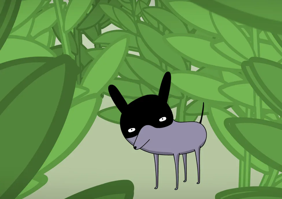 An animated creature in gray and black shown amongst a smattering of large, leafy plants