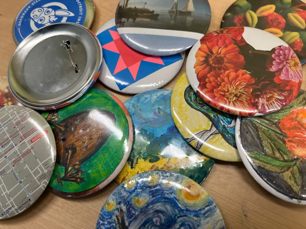 Examples of pins made in the DIA's art-making studio.
