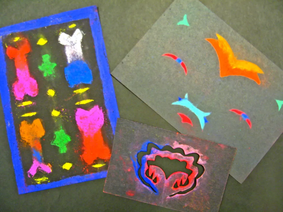 Examples of stencil art made in the DIA's art-making studio during a drop-in workshop.
