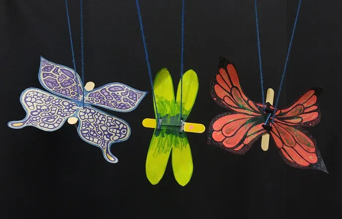 Examples of butterfly marionettes made in the DIA's Art-Making studio.
