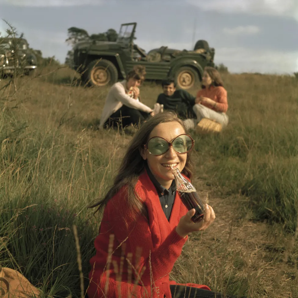 James Barnor (Ghana, b. 1929). Members of the Tunbridge Wells Overseas Club relaxing after a hot summer Sunday walk, Kent, c. 1968 (printed 2010–20). Gelatin silver print. Galerie Clémentine de la Féronnière, Paris.