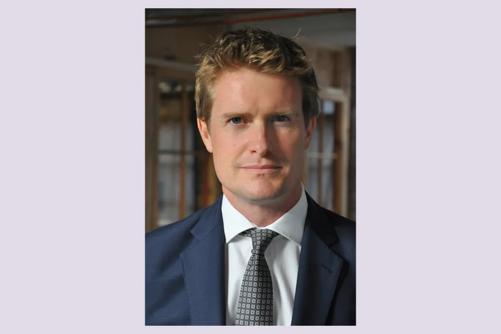Tristram Hunt pictured in a blue suit and gray tie