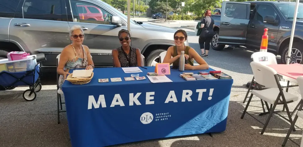 DIA Studio staff at an art-making table