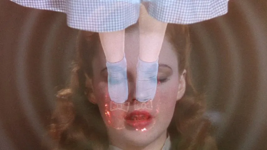 A trippy image featuring Judy Garland as Dorothy and her famous ruby slippers.