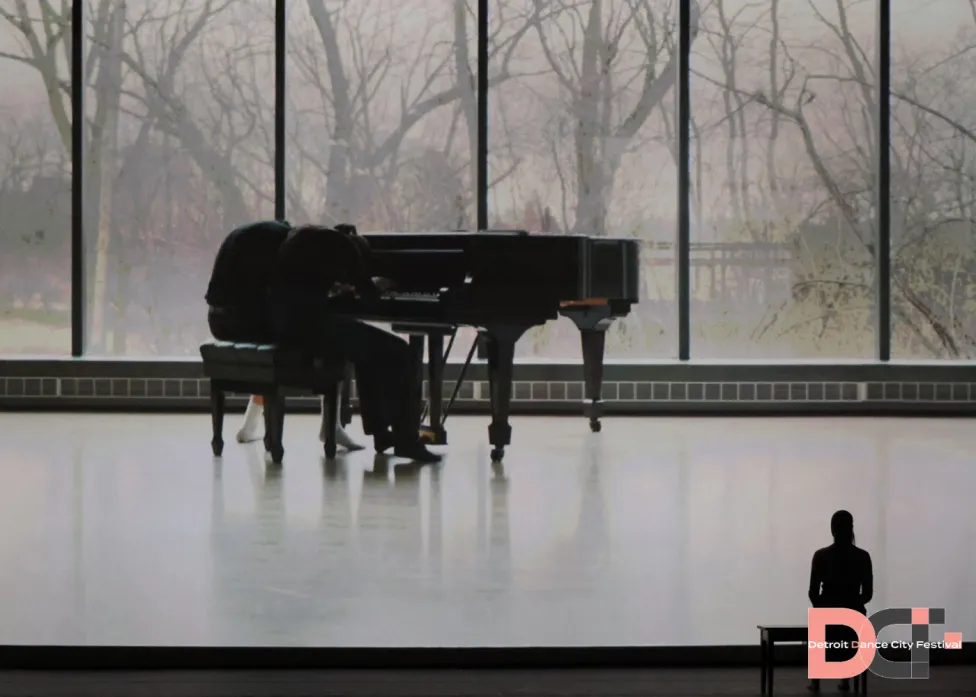 A piano on an empty stage