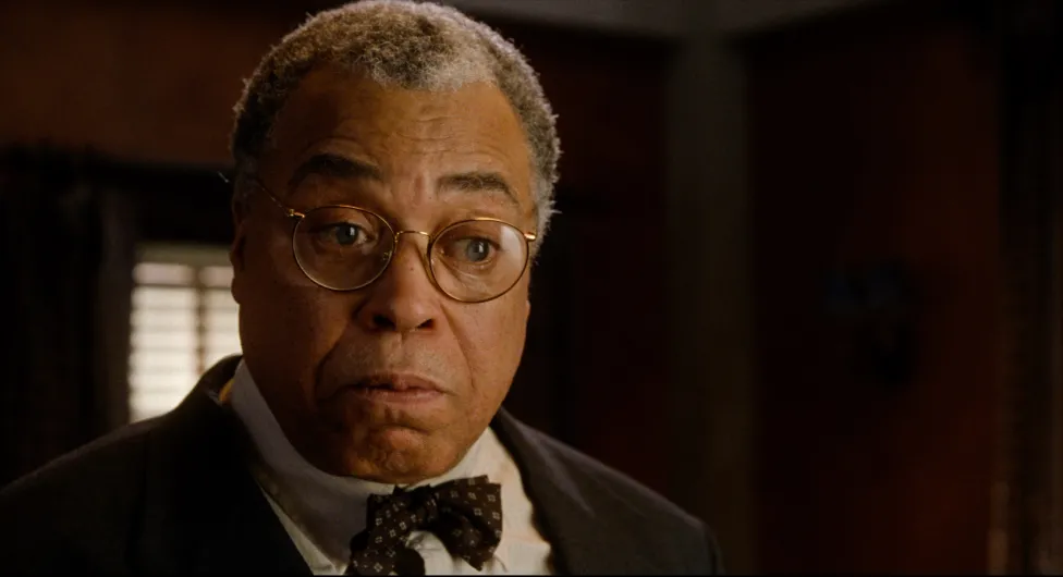 James Earl Jones in a suit and glasses