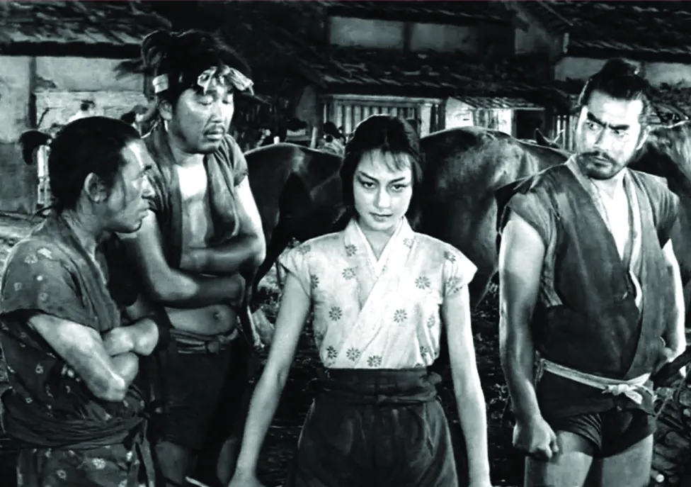 A woman stands proudly between three men