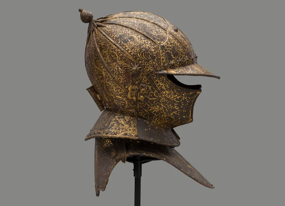 Circle of the Master MP (Brussels, present-day Belgium), Parade Burgonet (helmet) and Gorget (throat defense) of Jean de Cröy, Comte de Solre, ca. 1624, russeted steel, gold leaf, crimson-dyed velvet. Musée des Beaux-Arts, Valenciennes, France. Photo Credit: Detroit Institute of Arts
