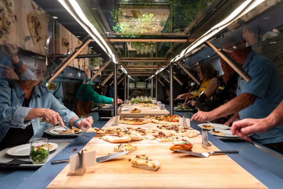 Digging into the pizza bar at member movie night