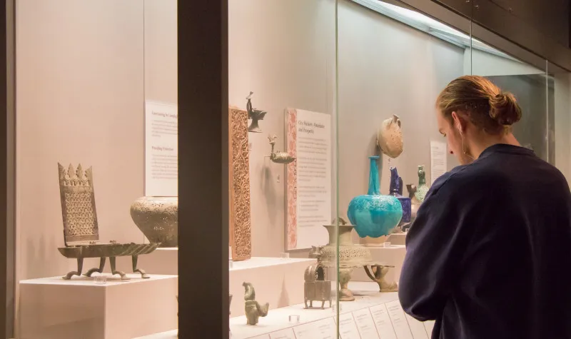 A visitor in the Islamic World Galleries at the Detroit Institute of Arts