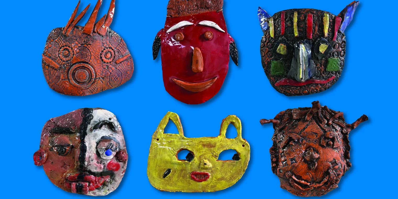 Masks made by community group members for the exhibition