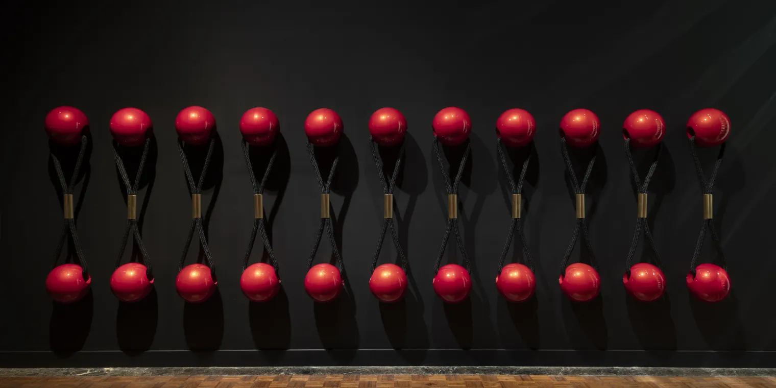 Tiff Massey, (American, b. 1981). Baby Bling, 2023. Metal beads, woven rope, brass. Collection of the artist.