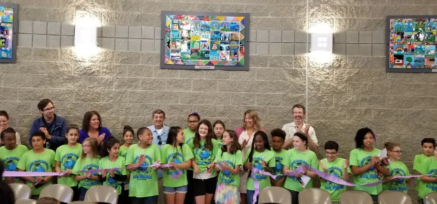 Margaret Black Elementary students cutting the ribbon