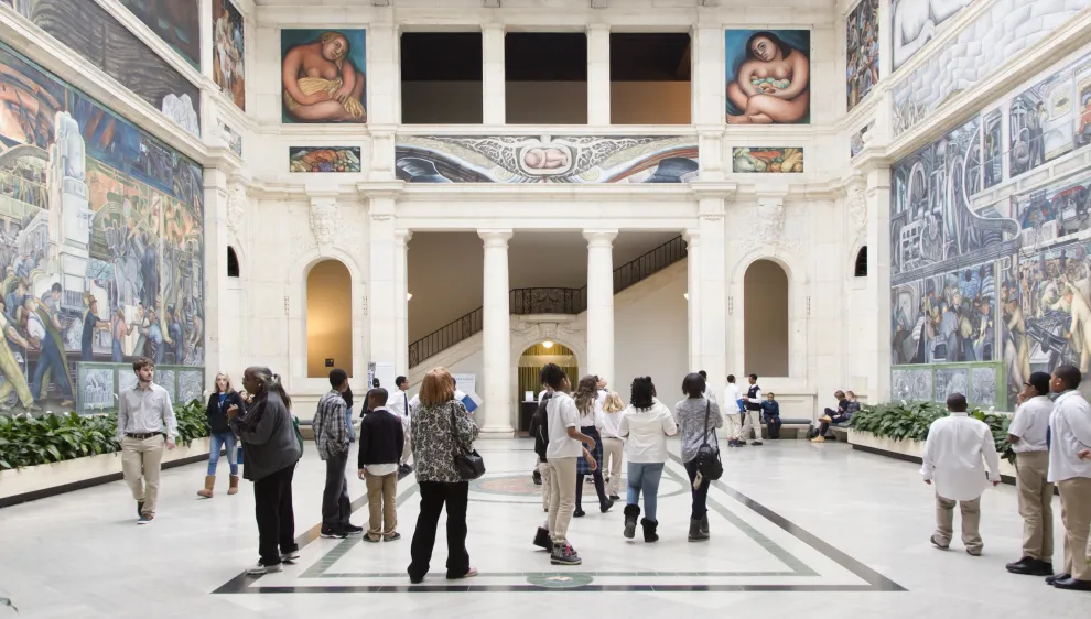 Visitors in Rivera Court at the Detroit Institute of Arts