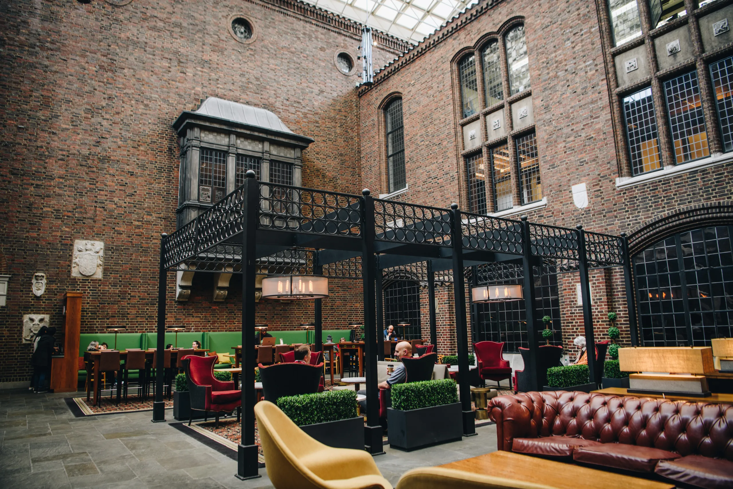 Kresge Court with seating and windows to the galleries and office space above