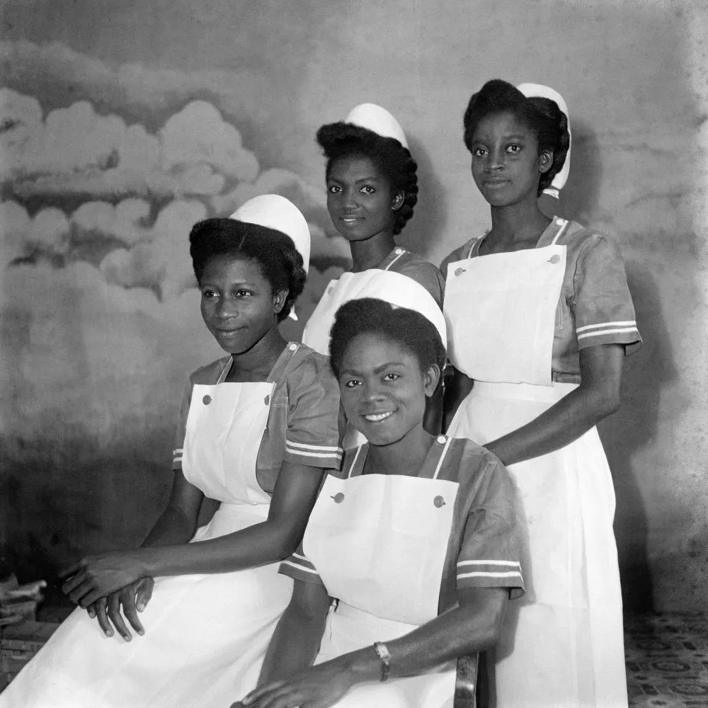 James Barnor (Ghana, b. 1929). Four Nurses (graduates of Korle-Bu Teaching Hospital), Ever Young Studio, Accra, c. 1955 (printed 2010–20). Gelatin silver print. Autograph, London.