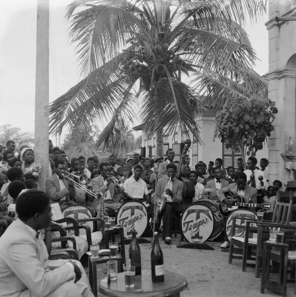 James Barnor (Ghana, b. 1929). Tempos Band, birthday celebrations, Adabraka neighborhood, Accra, 1958 (printed 2010–20). Gelatin silver print. Galerie Clémentine de la Féronnière, Paris. © James Barnor, courtesy Galerie Clémentine de la Féronnière, Paris.