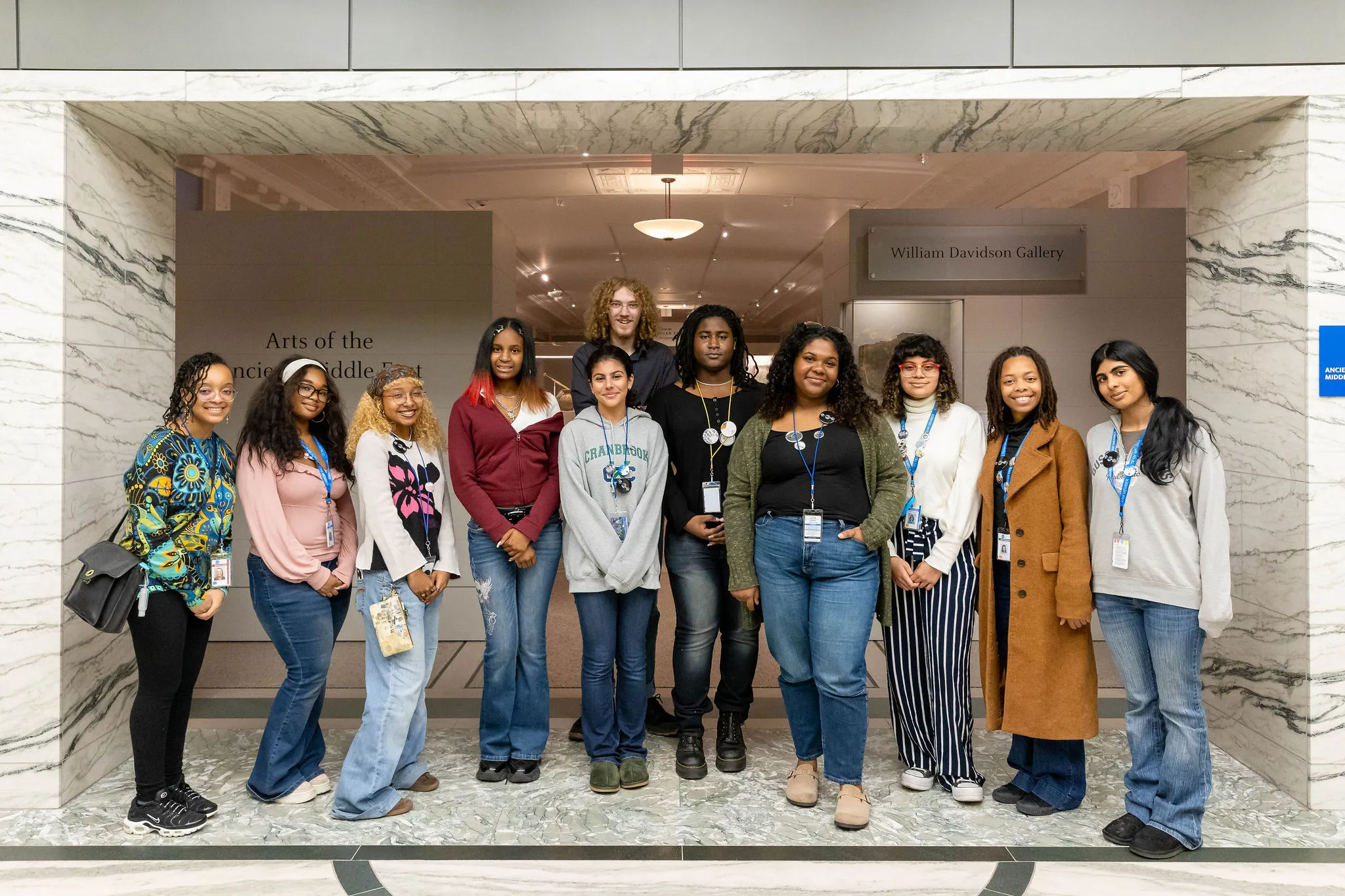 The DIA Teen Arts Council pose together in the museum