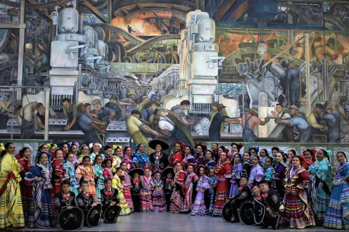 Ballet Folklorico de Detroit posing in the Detroit Institute of Arts' Rivera Court.