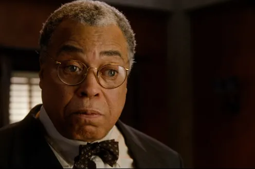 James Earl Jones in a suit and glasses