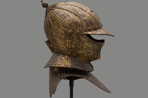 Circle of the Master MP (Brussels, present-day Belgium), Parade Burgonet (helmet) and Gorget (throat defense) of Jean de Cröy, Comte de Solre, ca. 1624, russeted steel, gold leaf, crimson-dyed velvet. Musée des Beaux-Arts, Valenciennes, France.  Photo Credit: Detroit Institute of Arts