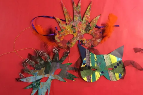 Examples of celebration masks made in the DIA's Artmaking Studio