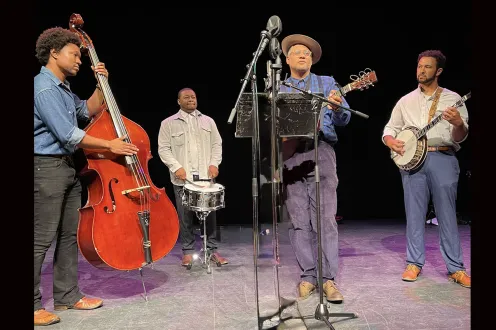 Dom Flemons and band onstage