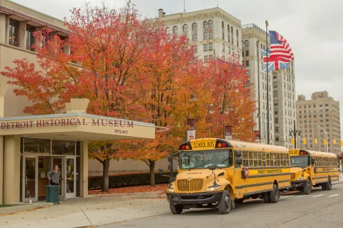 Detroit Historical Museum entrance with two school buses out front