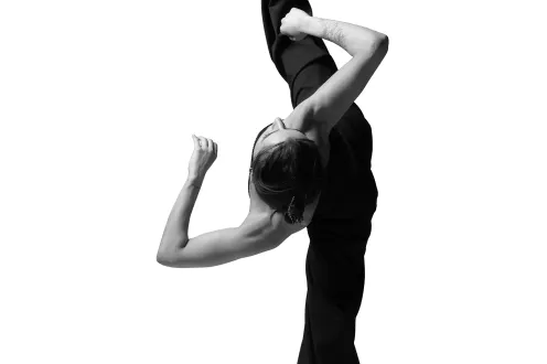 A person doing the standing splits