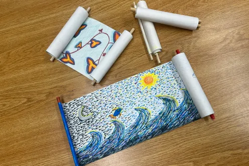 Examples of scrolls made in the DIA's Artmaking Studios