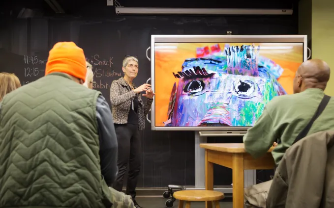 DIA staff member leads discussion on artwork