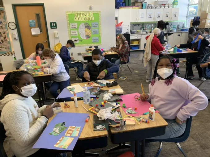 Students enjoy a virtual meaning through art-making field trip in their own classroom